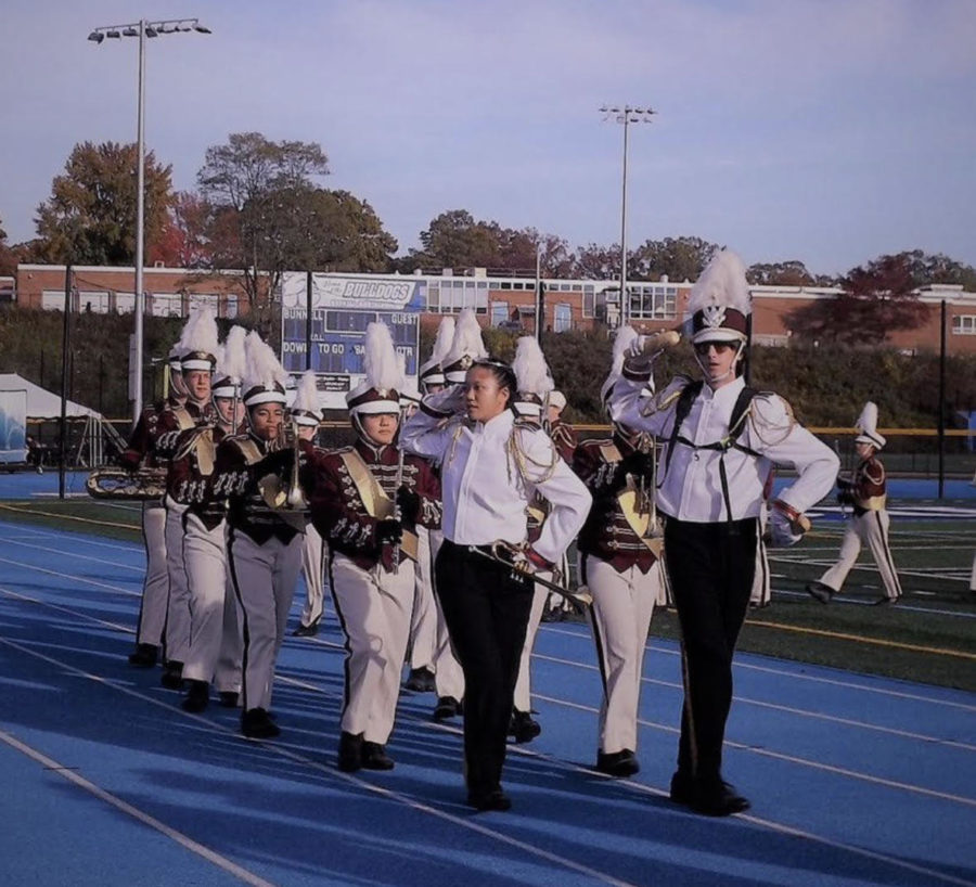 The marching band led by Aiden Rodgers (right) and Rose Zhou (left) in competition