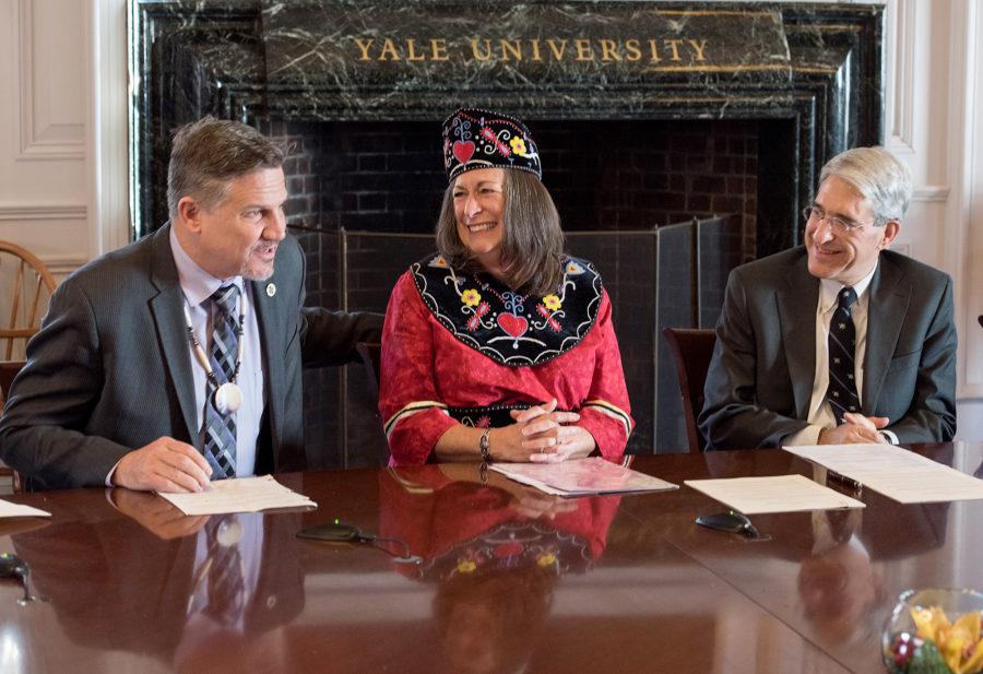 Photo by Mara Lavitt
New Haven, CT
November 17, 2017
Photography: ©Mara Lavitt

In Woodbridge Hall, Yale and the Mohegan Tribe signed an agreement that formalized cooperation between the Yale Peabody Museum of Natural History and the Mohegan Tribes Tantaquidgeon Museum. From left: Mohegan Tribal Chairman Kevin Brown; Mohegan Chief Marilynn Malerba, Yale Univ. President Peter Salovey.