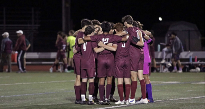 The+boys+soccer+team+getting+ready+for+a+game+at+the+ELHS+turf.