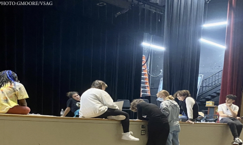 Tech crew working hard together on the set design.