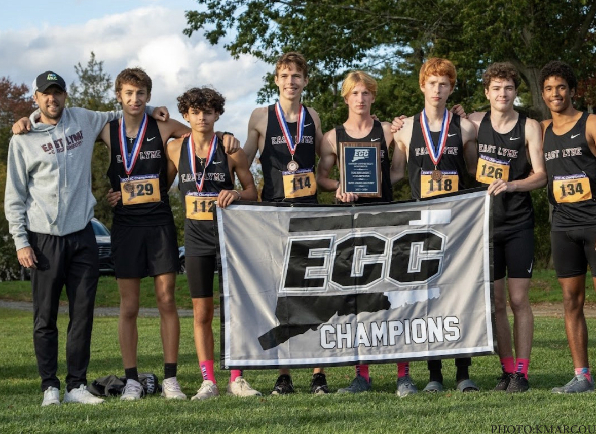 ELHS runners show off their banner after winning ECC’s in November.