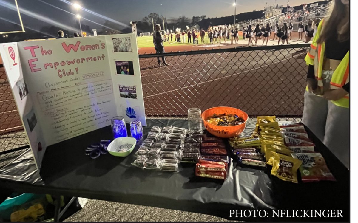 The Women’s Empowerment Club sold snacks at a football game to raise money.