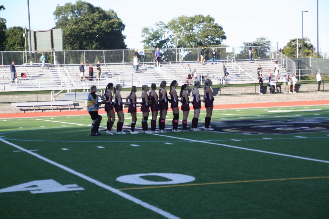 ELFH lined up during anthem for varsity game.