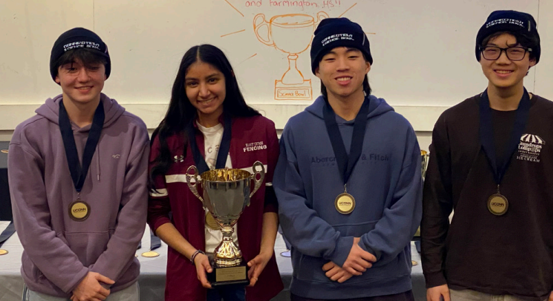 Science Bowl champions hold their trophy at the UConn Storrs campus on Feb. 28