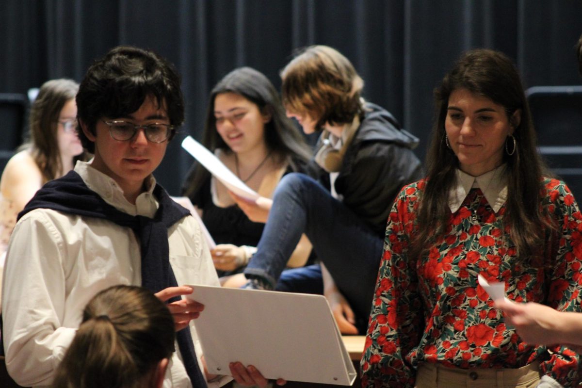 Photo featuring actor Nathaniel Scott and director Sara Kelly running lines