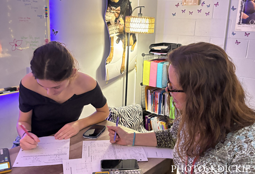 MTSS teacher Kerri Legg helps junior 
Summer Stefanelli.